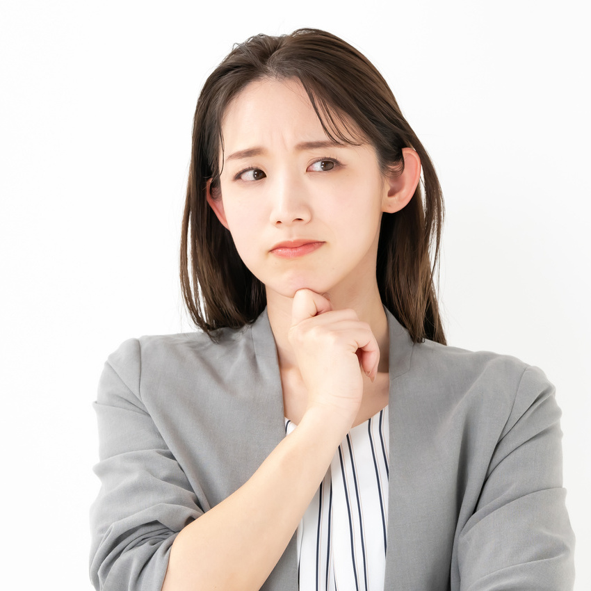 悩む人